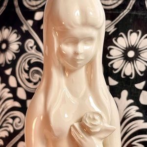 white glazed ceramic figurine.